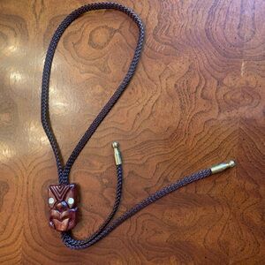 Vintage Unique Handcrafted Brown Bolo Tie with Carved Slide